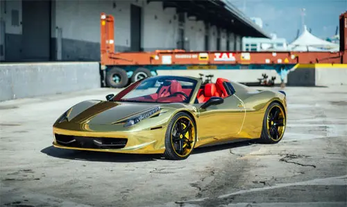 CLASS: Ronaldo Shakes Up the Streets of Arabia Behind the Wheel of a Gold-Plated Ferrari 488 GTB