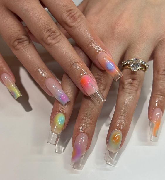 Long square shaped clear nails with colorful aura gradient nail art