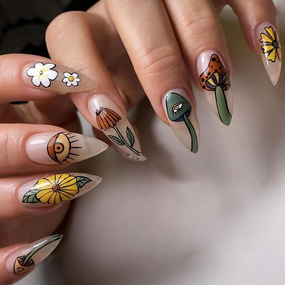 Clear long stiletto nails with Halloween-inspired nail designs