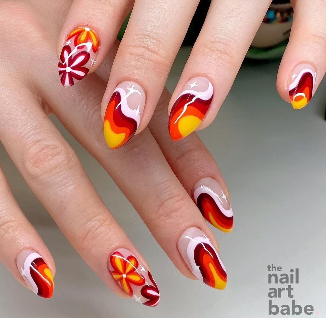 Multicolored swirls and flowers on medium almond nails