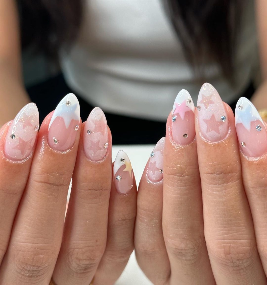 White and pastel star nails.