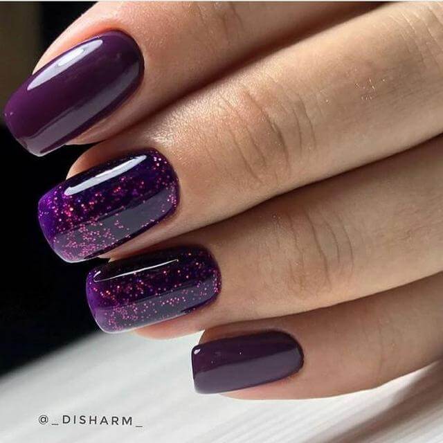 Cute short dark purple nails with glitter