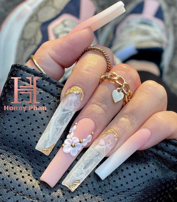 White smokey marble nail art on super long square acrylic nails