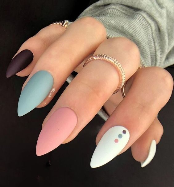 Pastel colors nail polish in matte finish on medium stiletto nails