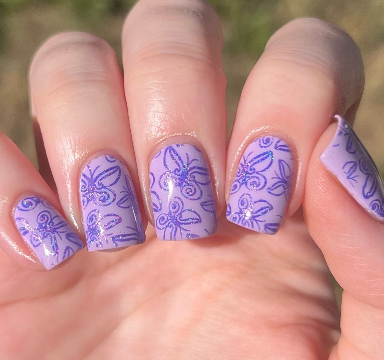 Perfect shade of purple and butterflies with a darker tone of it suit very well with each other. This manicure will make you feel cool and cute at the same time.
