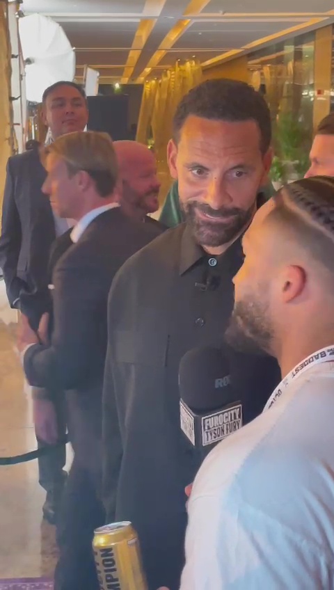 Rio Ferdinand opted for an oversized shirt