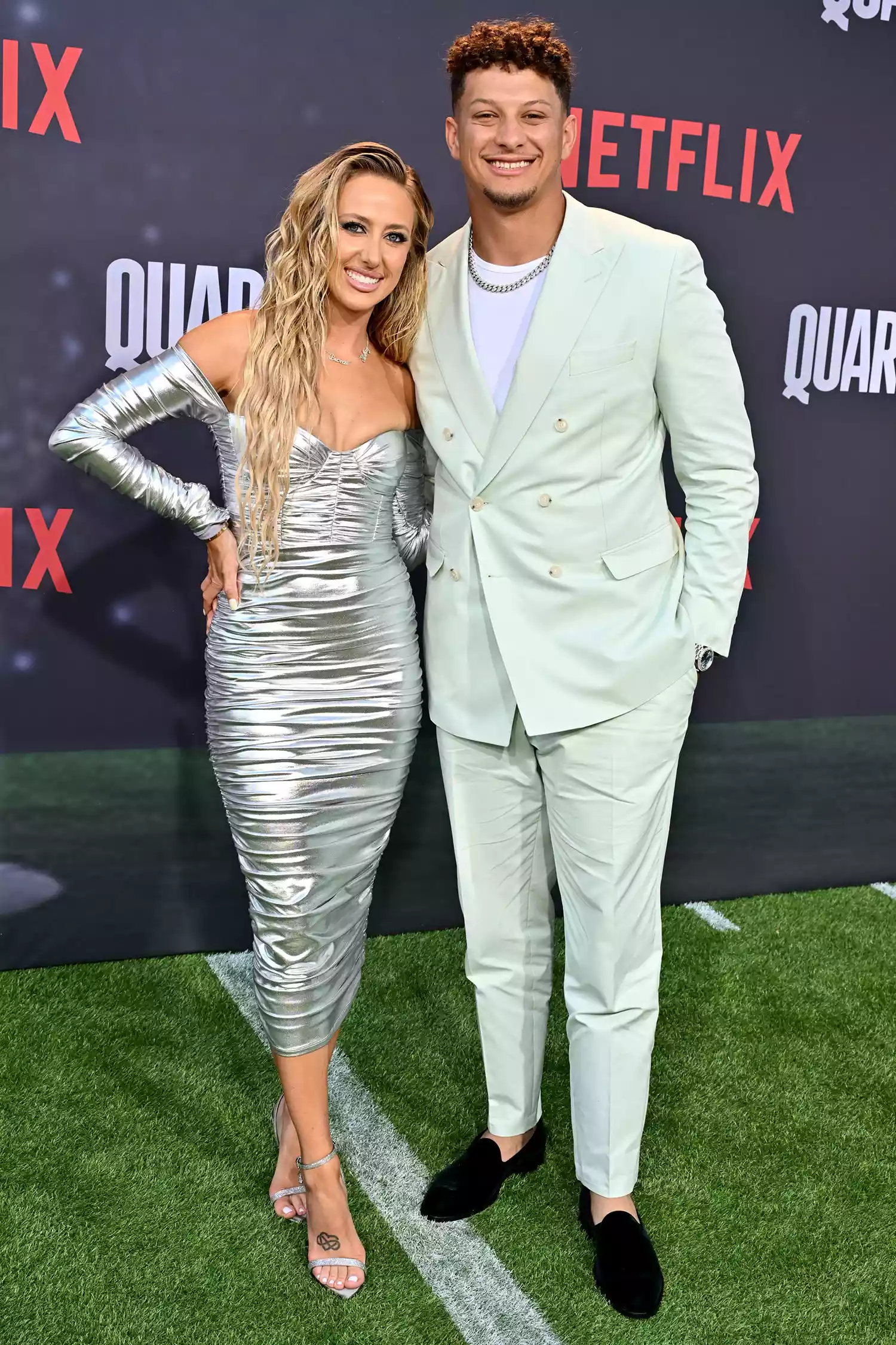 Patrick Mahomes and his wife Brittany Mahomes arrive for the premiere of Netflix's docuseries "Quarterback" 