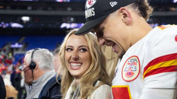 Brittany Mahomes smiles at her husband Patrick Mahomes #15 of the Kansas City Chiefs after the AFC Championship NFL football game at M&T Bank Stadium on Jan. 28, 2024, in Baltimore, Md.