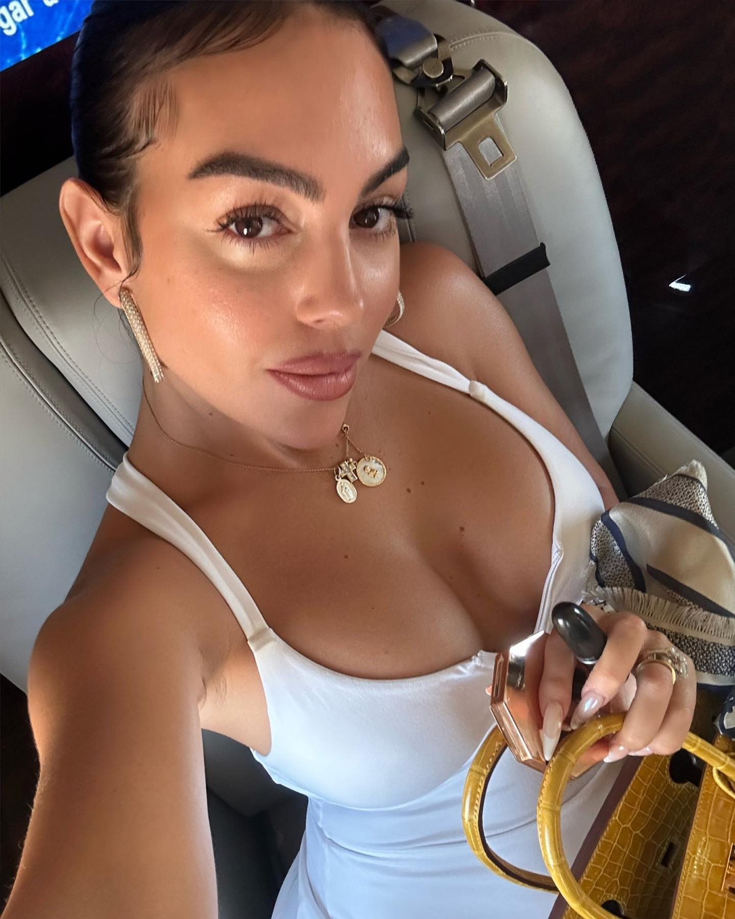 Inside Georgina Rodriguez's private jet as Cristiano Ronaldo's girlfriend  puts on busty display in short white dress | The US Sun