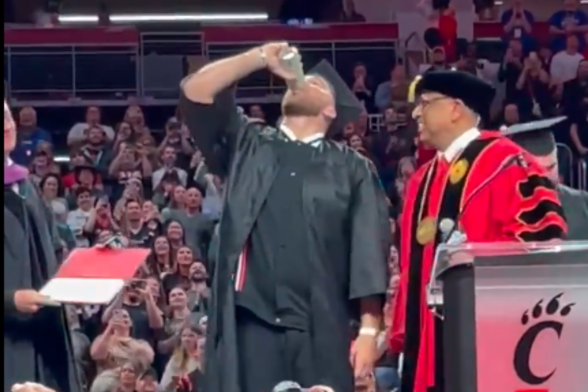 Travis Kelce graduation beer chug analyzed by body language expert claiming  he's 'in a state of eternal teenager' | Marca