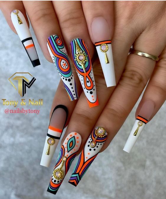 Matte white nail polish with bright abstract nail art on long coffin nails