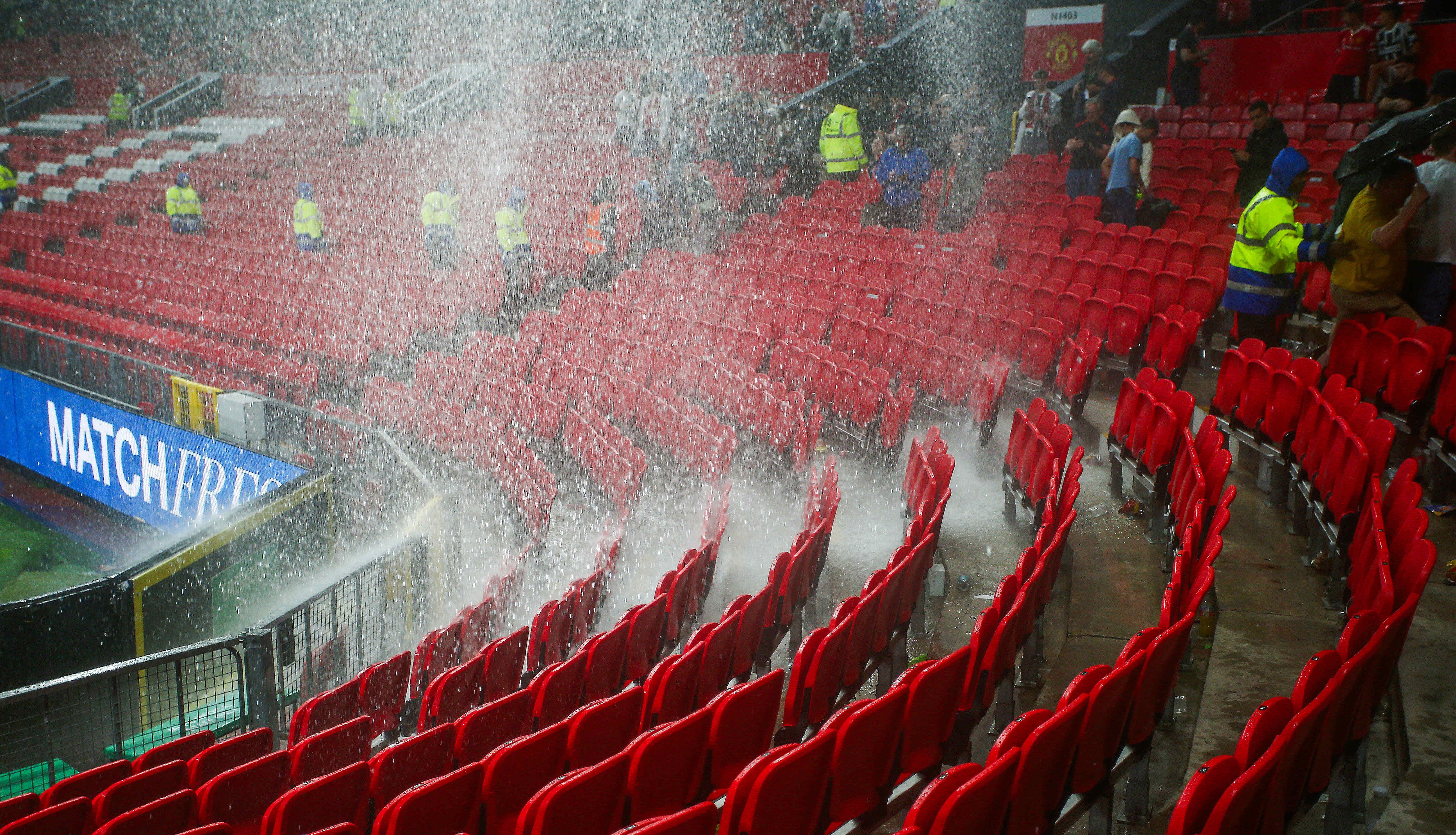 Seats next to the pitch were flooded by the rain coming in