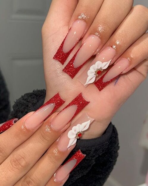 Glittery dark red French tips with 3D white flowers on long square nails