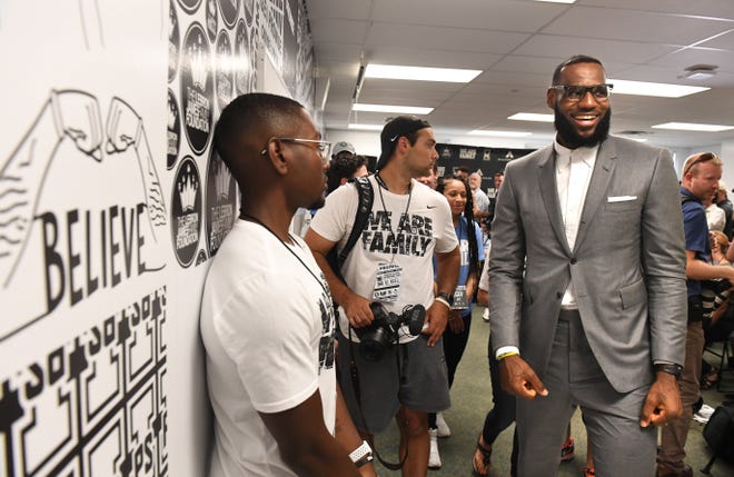 LeBron James finishes a news conference in a classroom at the I Promise School in Akron, Ohio, on Monday, July 30, 2018. LeBron James partnered with the University of Akron to guarantee all of his school's students college scholarships. (Wally Skalij/Los Angeles Times/TNS)