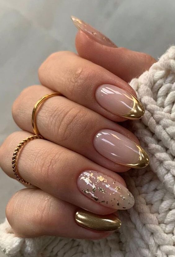 Clear round nails with gold French tips and gold foil