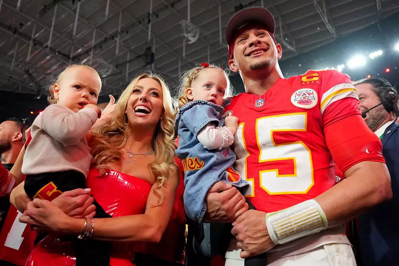 Super Bowl LVIII: Kansas City Chiefs Patrick Mahomes (15) poses with wife Brittany Mahomes and their children Patrick Bronze and Sterling Skye following victory vs San Francisco 49ers at Allegiant Stadium.