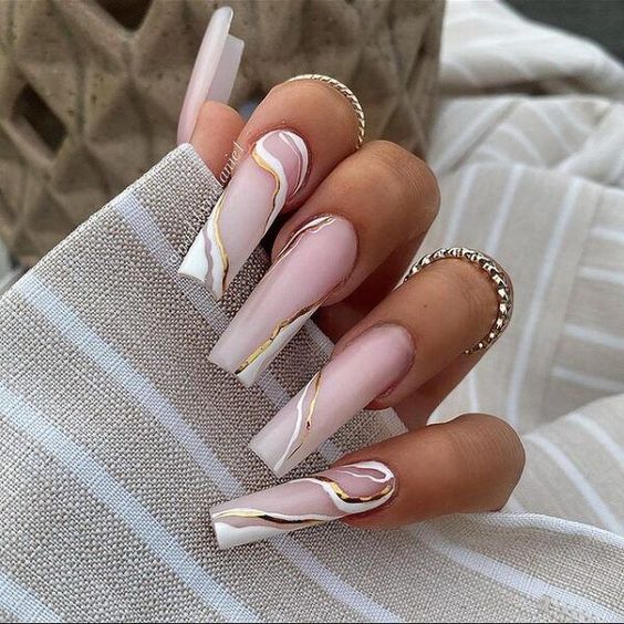 Clear white acrylic nails with white and gold swirls