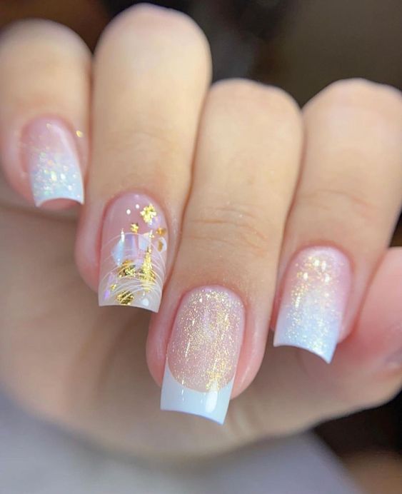 Clear short square nails with white French tips and gold dust
