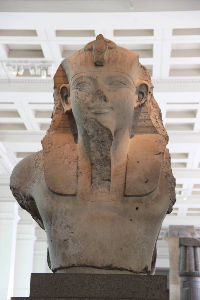 A limestone bust of Amenhotep III.