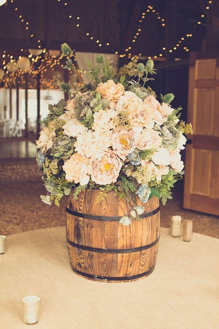 Bevy of Ivory Blooms in Rustic Barrel