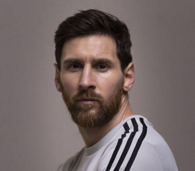 Messi's slicked back hair