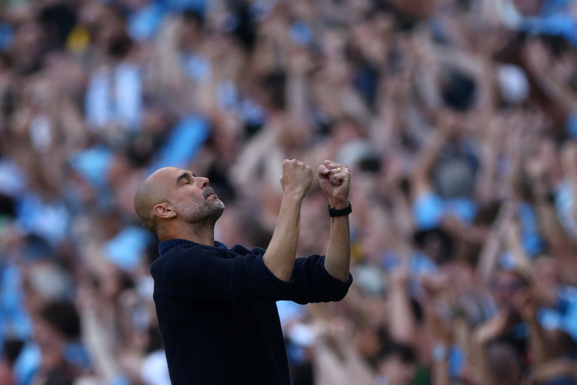 Pep Guardiola looks on in relief as City double their advantage