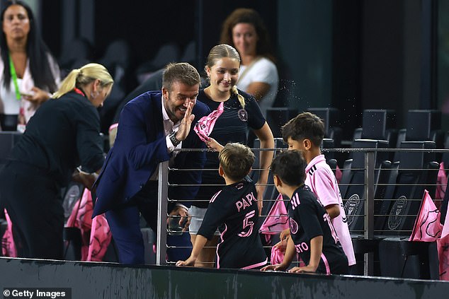 The England legend went in for a high five with the son of Messi's teammate Sergio Busquets