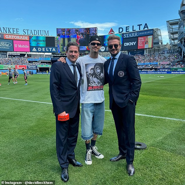 Beckham posed with sports agent David Gardner and son Romeo Beckham at Yankee Stadium