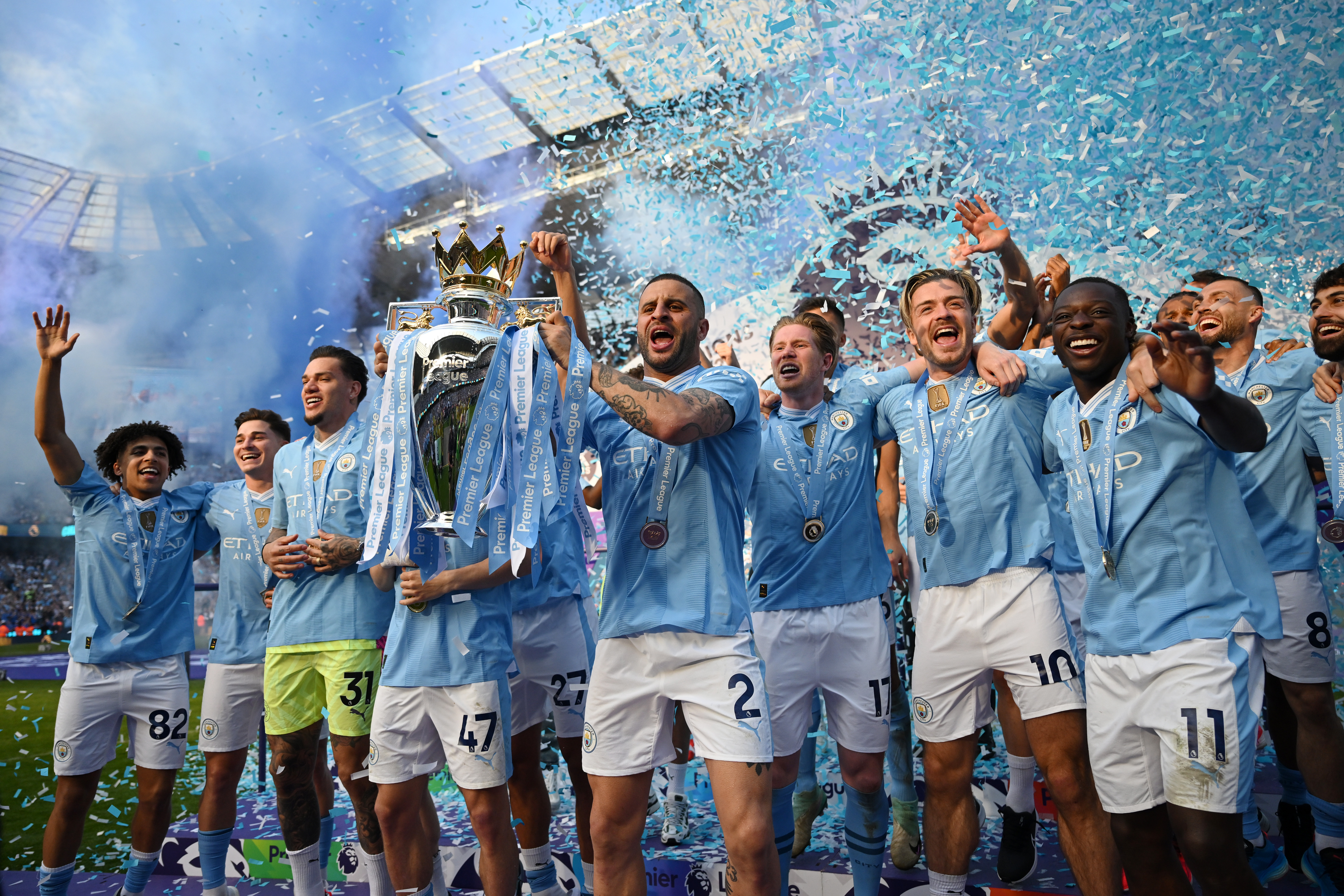 Kyle Walker lifts the Premier League trophy